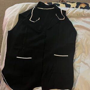 BloomChic Black Sleeveless Blazer with White Trim